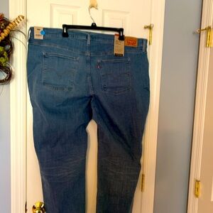 724 High Rise Slim Straight Leg Jeans